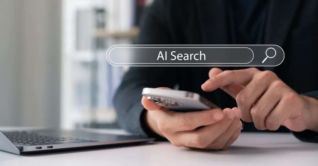Zero-Click Search 1 Person using their phone to search online with AI tools generating zero click search responses